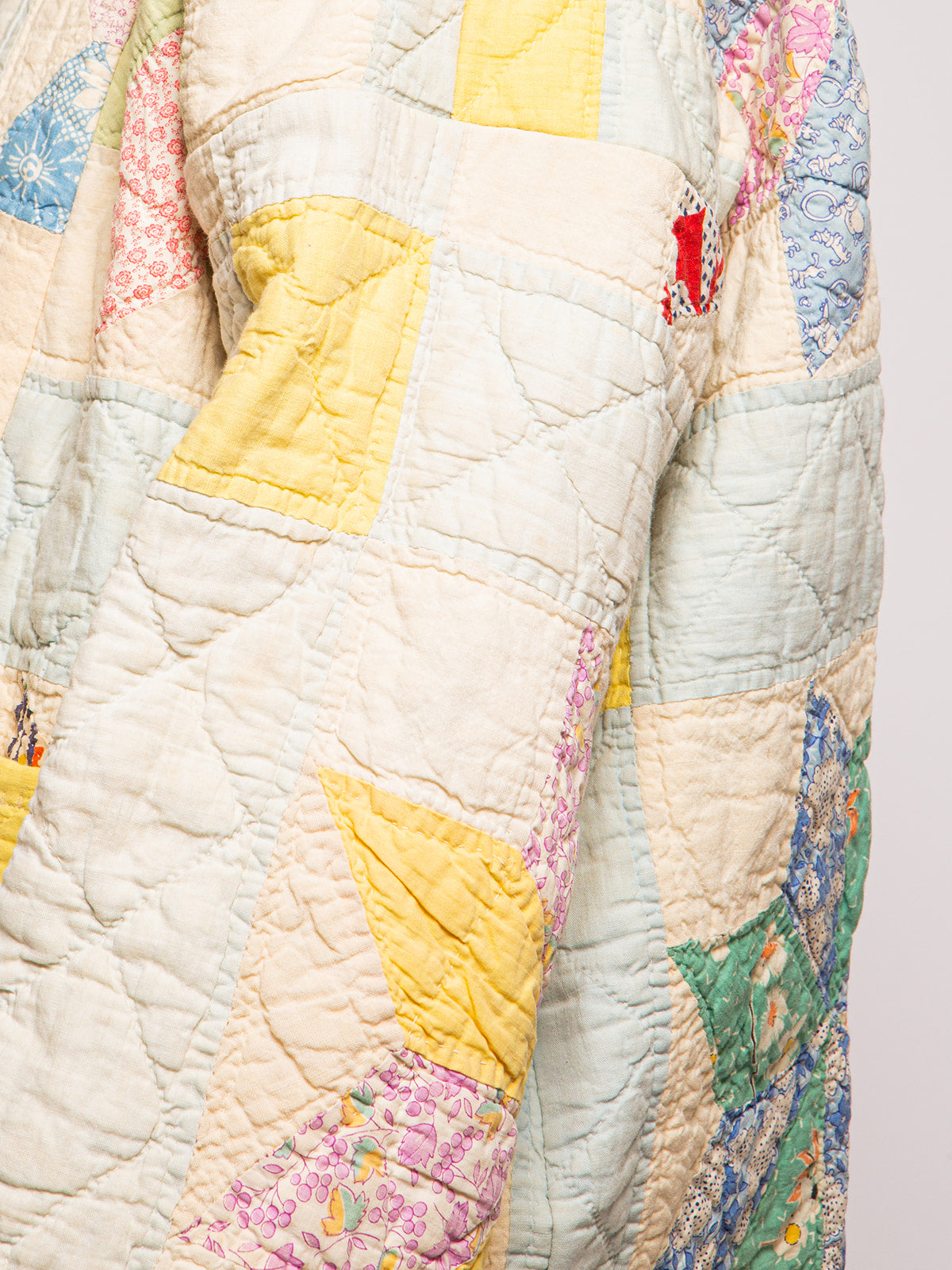 "PASTEL STARBURST" QUILTED COAT